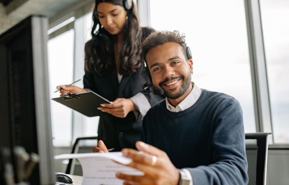 Support agents on headsets in an office
